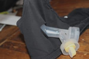 pumping bra made from a sports bra or nursing bra