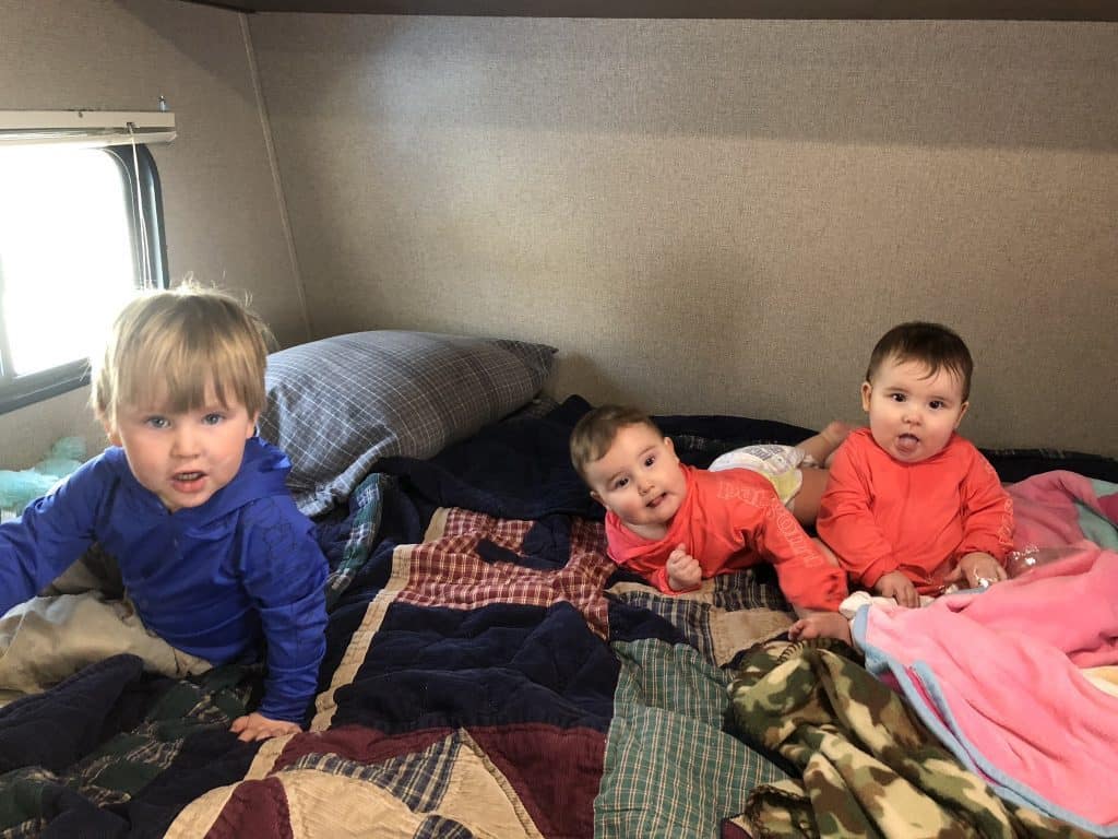 camping tips for newborns and toddlers use the queen bed to play on during the day