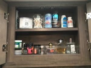 camper cabinet organization with bins