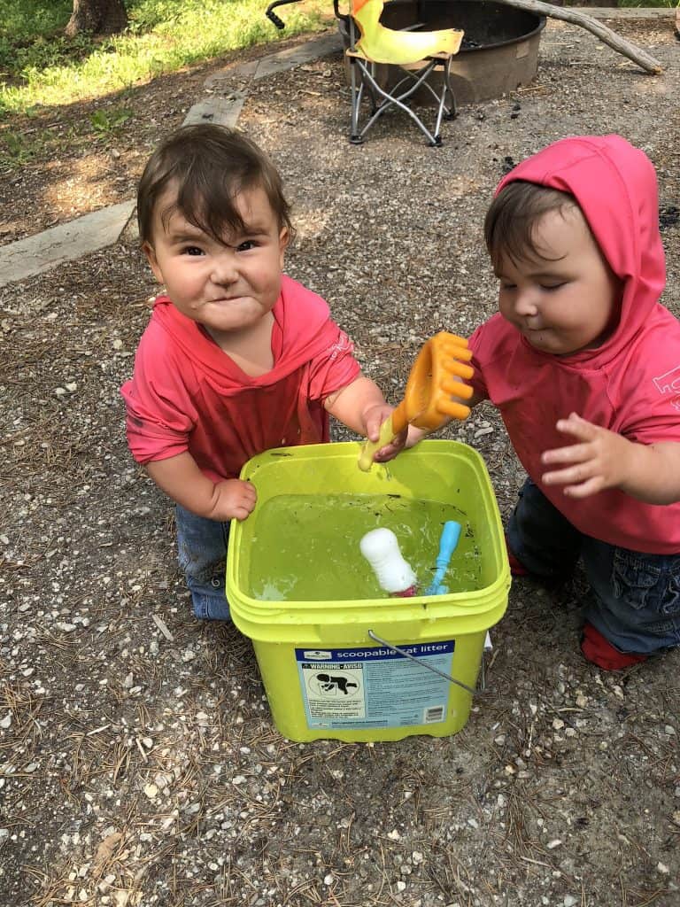 tip for camping with a baby - have a splash bucket! They love dropping rocks and toys into them!