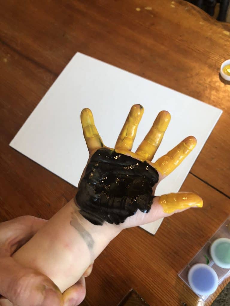 toddler handprint craft for mom or grandma making a sunflower