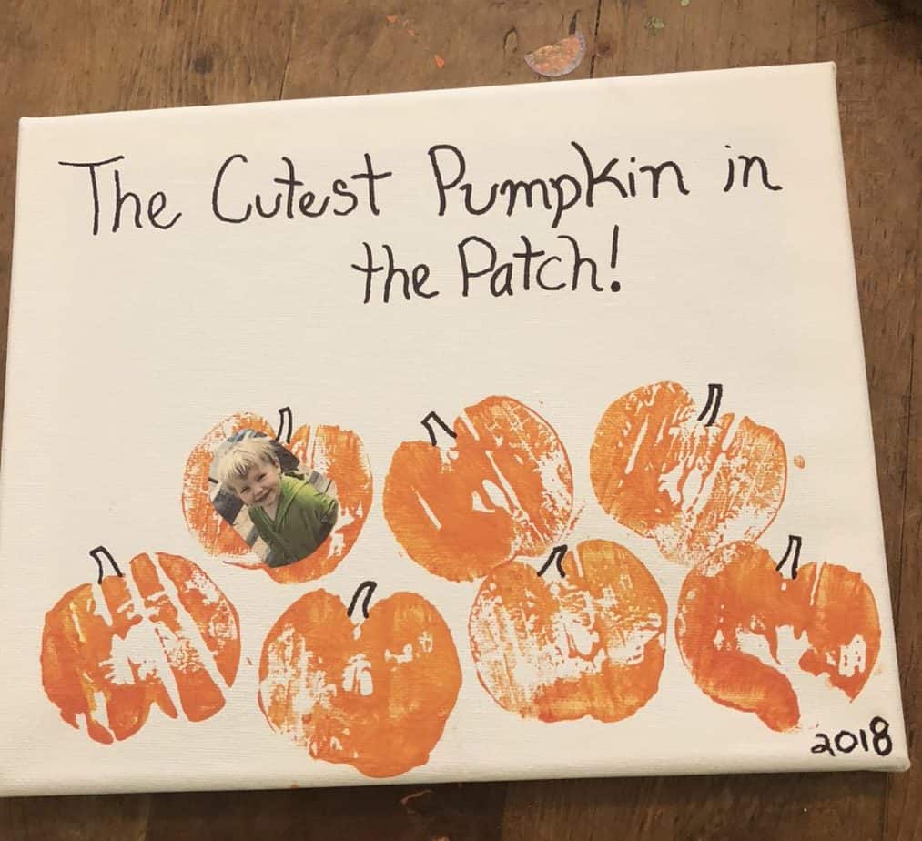 kids picture in pumpkin craft