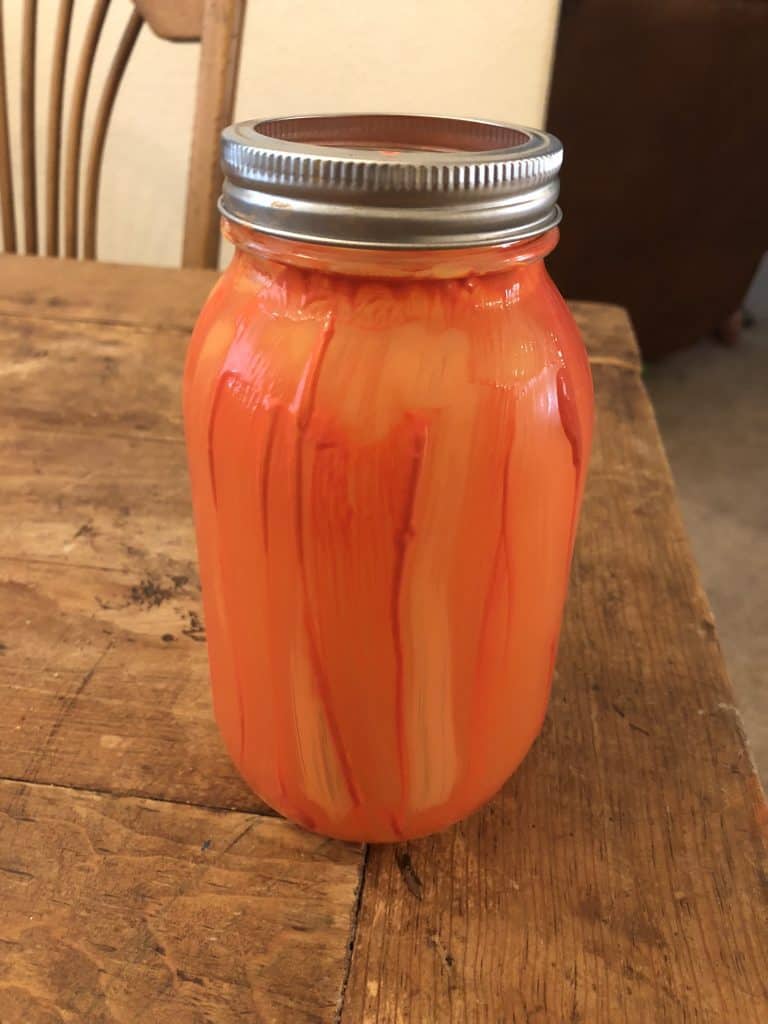 mason jar painted like a pumpkin