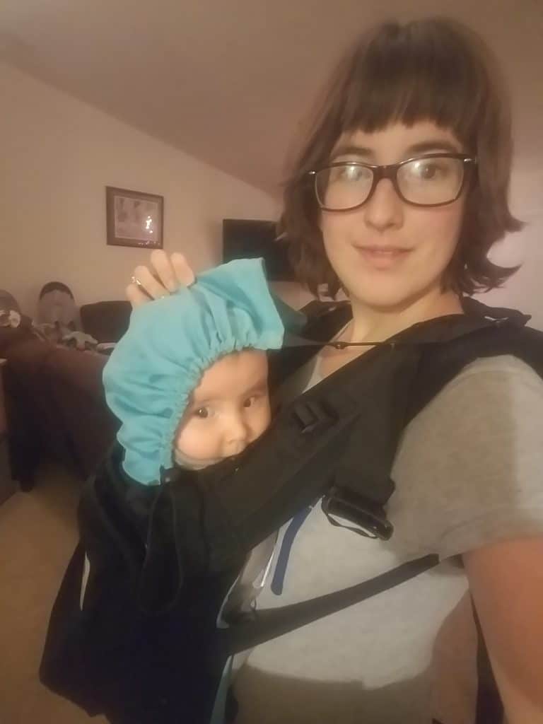 new baby hack tip use a carrier to get chores done