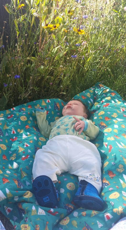 bring a mat when camping with a newborn tip