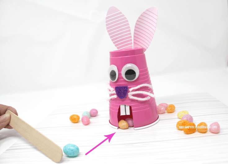 fun easter bunny cup craft and game for kids with jellybeans