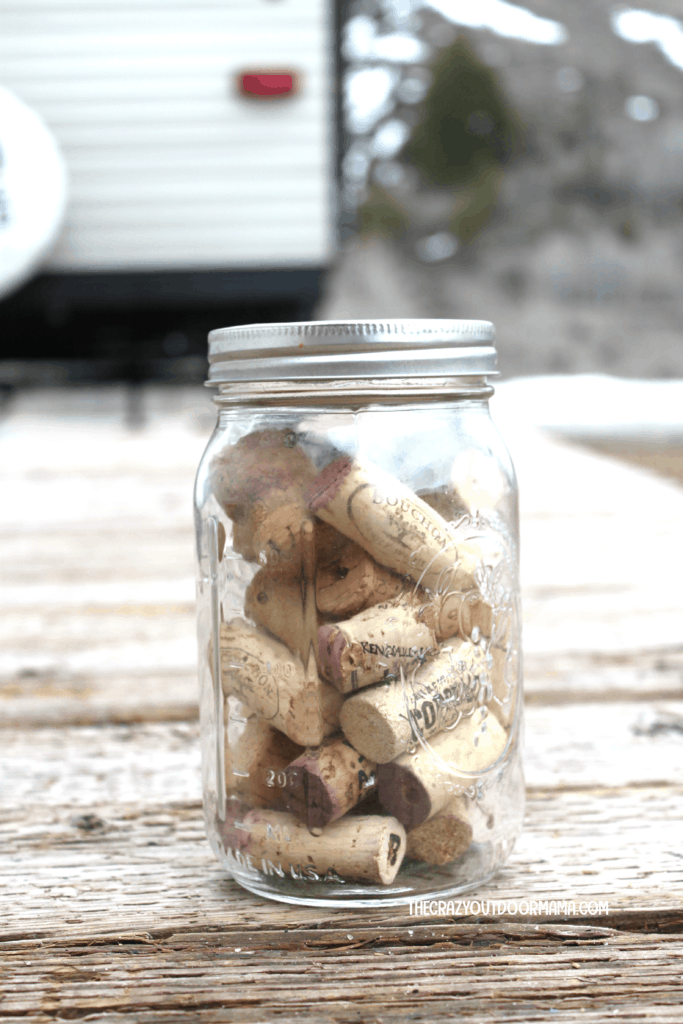 interesting home made fire starter with wine cork and isopropyl alcohol for camping