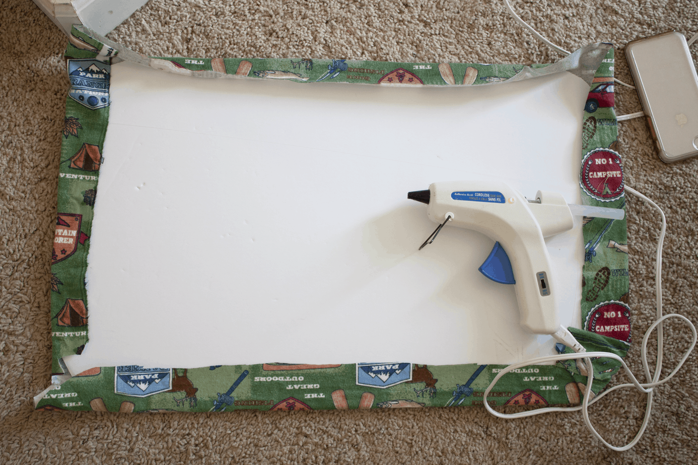 glue edges with hot glue gun for camper blackout cover