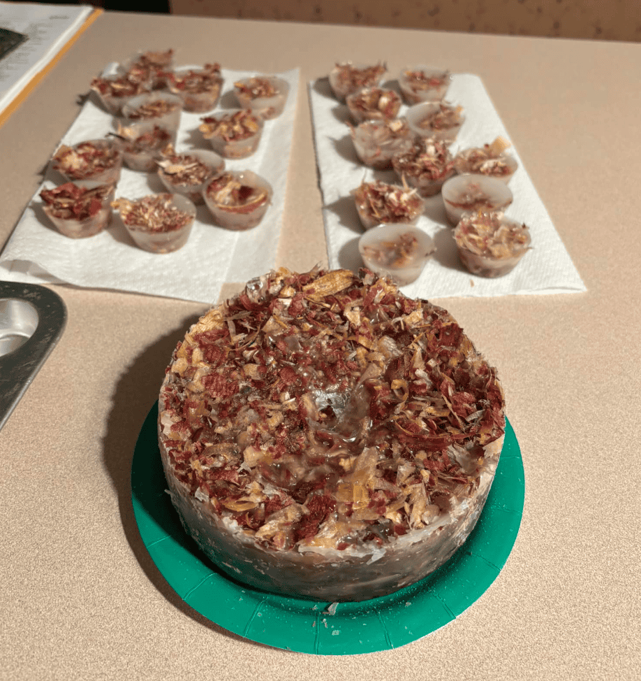 fire starter mace with wood shavings and wax in cupcake pan