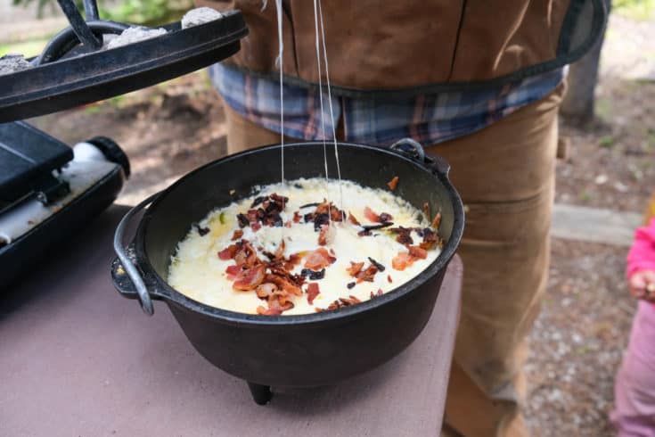 dutch oven cheese dip at camp with jalapeno and bacon