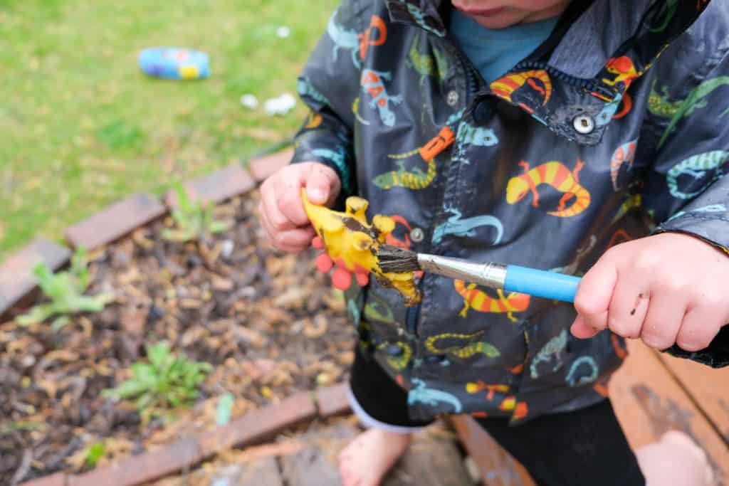 mud bath for outside rain fun with kids
