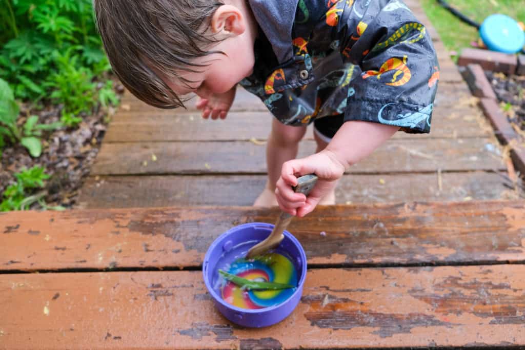 make rain soup for outdoor rain activity with kids