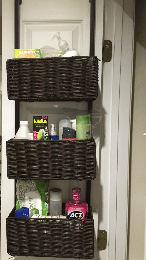 wicker over the door organizer to tidy rv bathroom