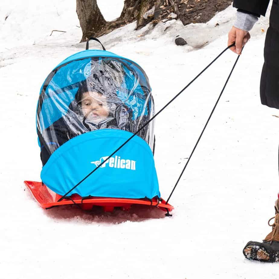 enclosed baby sled to keep babies warm