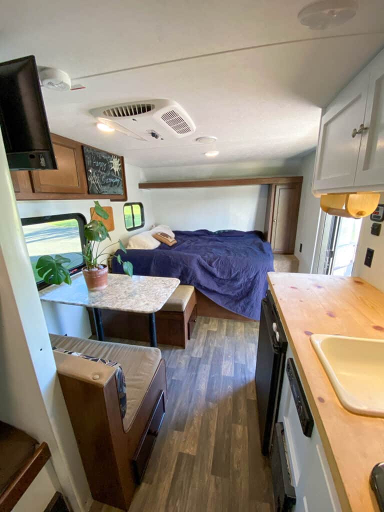 use wide zoom feature to make camper look roomier and nice for listing photos