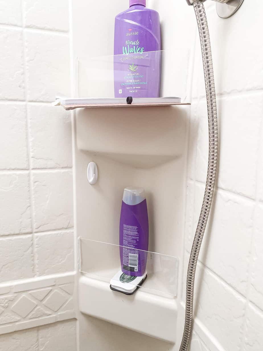 Use command strip hooks for shower caddies.  Bathroom organization diy,  Diy bathroom storage, Easy bathroom organization