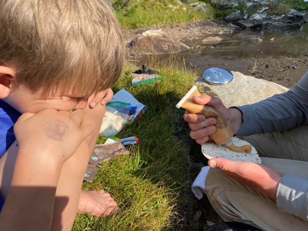 use peanut butter and honey in a squeeze tube instead of jelly for backpacking trip with kids