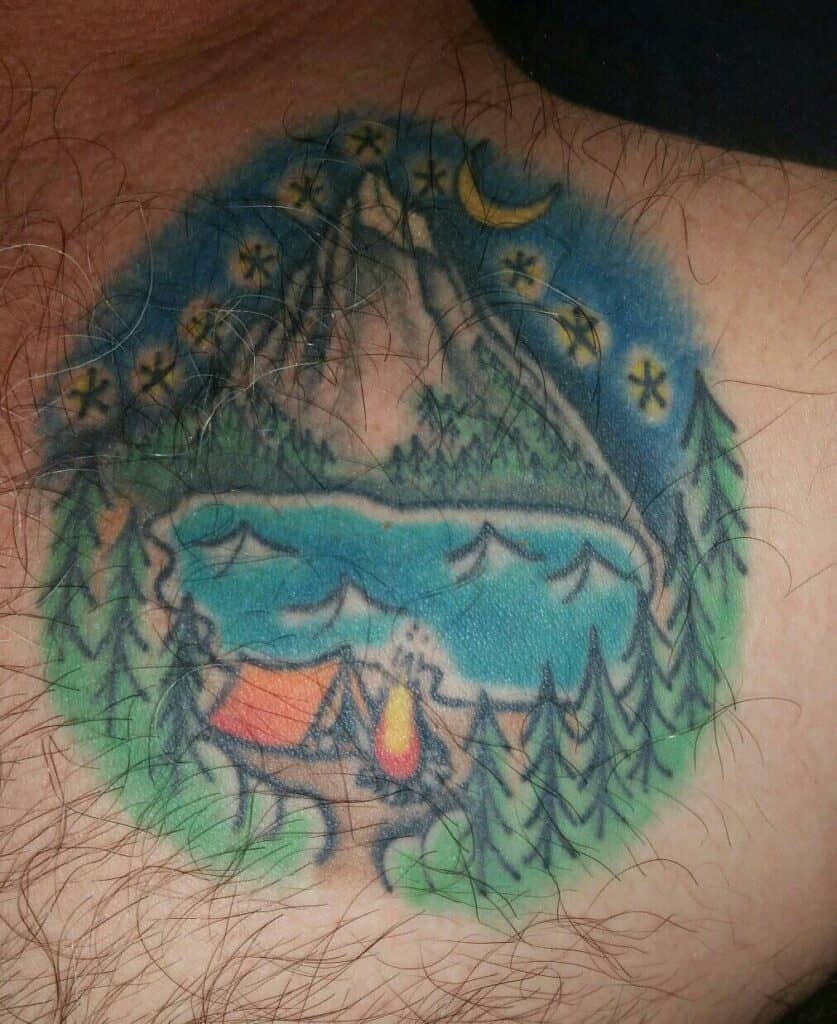 color tent, campfire and mountains tattoo