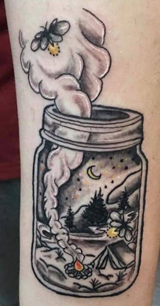 camping scene in mason jar tattoo 