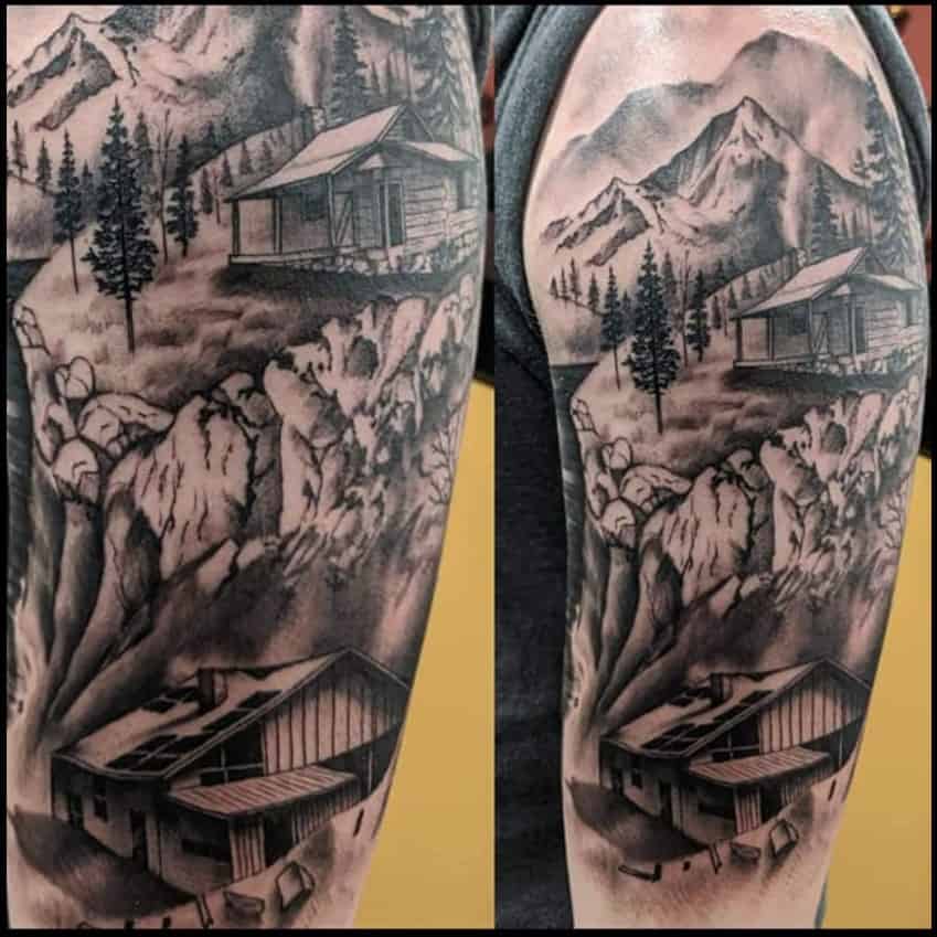mountain cabin black and white shoulder tattoo