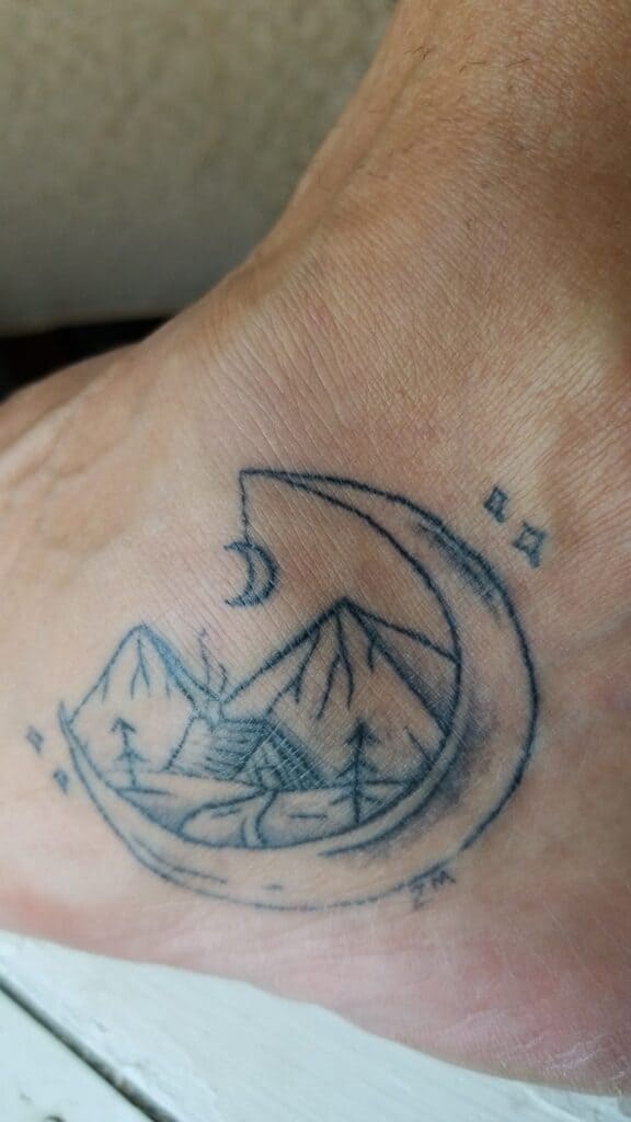 moon cabin and mountains minimal nature tattoo