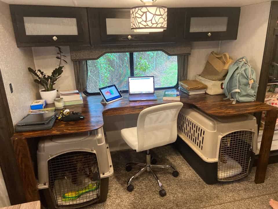home office space in rv with kennel for dogs