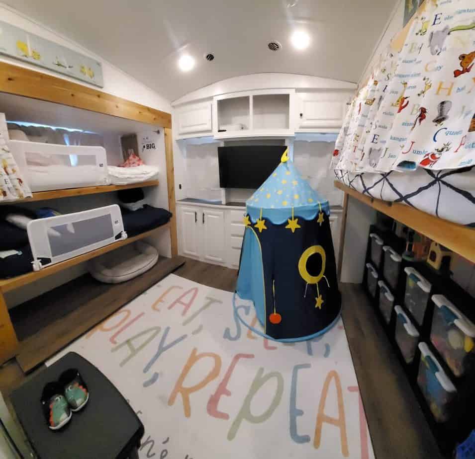 kids bunkhouse with bunk beds and storage