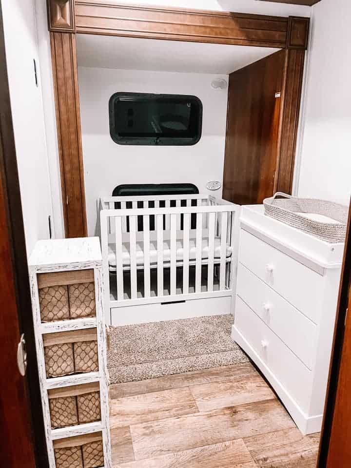 mini crib in camper nursery