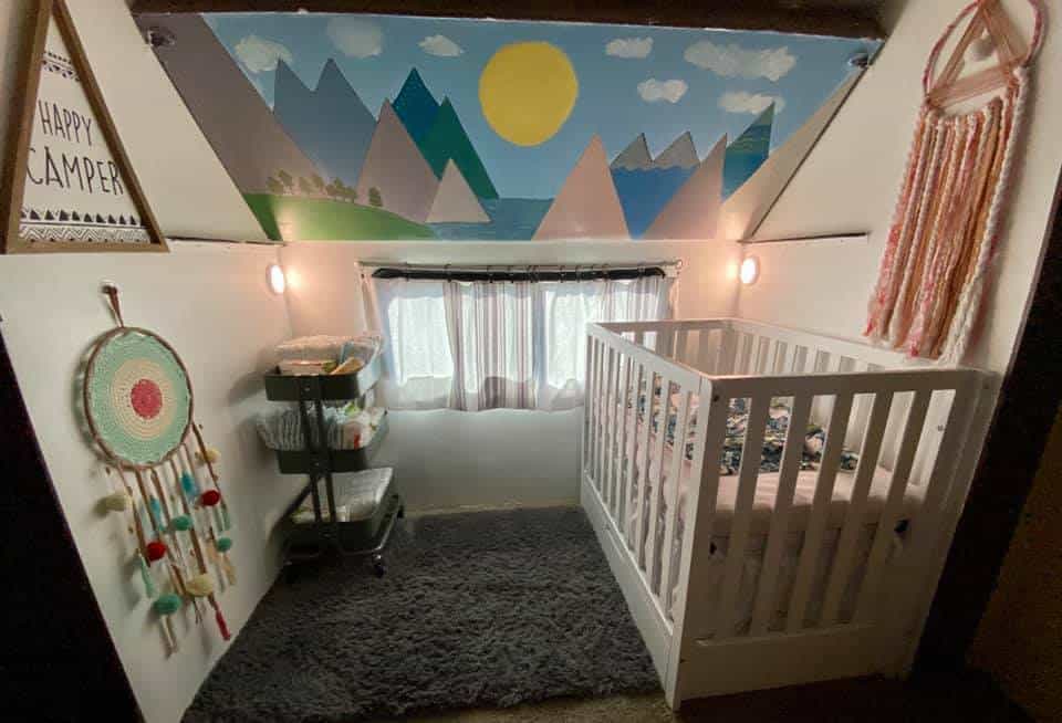 cute nursery in rv camper with crib