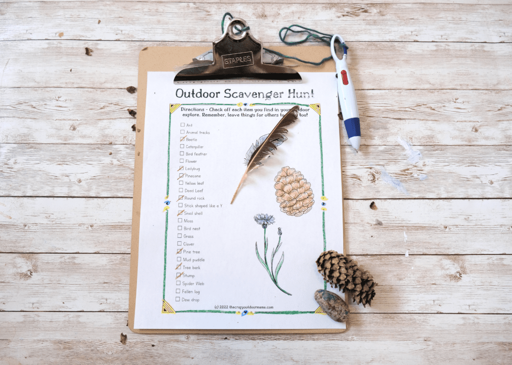 simple printable outdoor scavenger hunt list style with pinecone and bird feather decoration