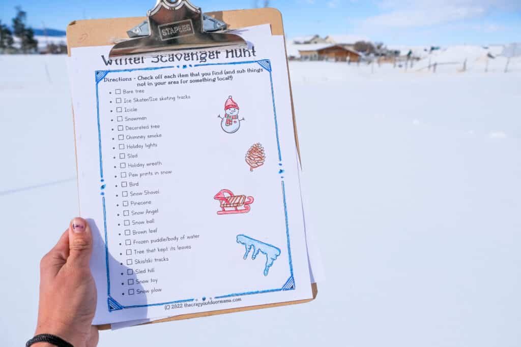 list style winter scavenger hunt in front of snowy landscape