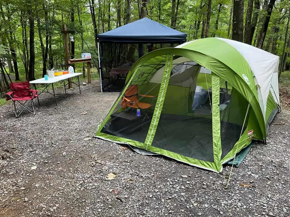 campsite setup with mudroom for tent