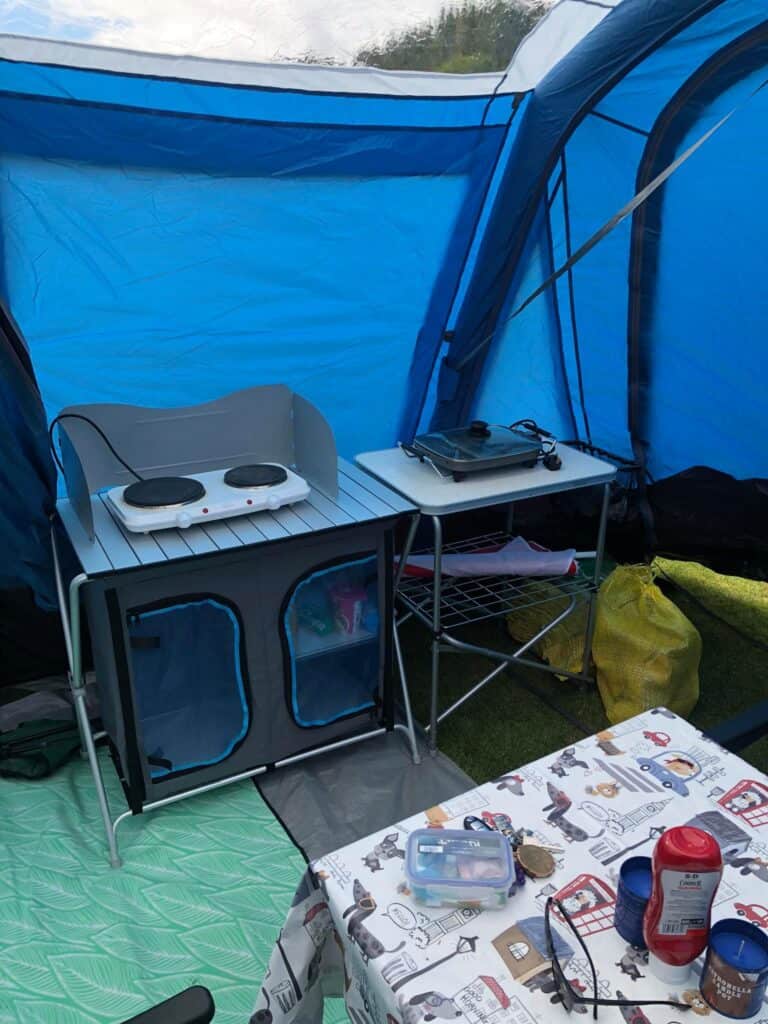 pop up camp kitchen  set up area in tent 