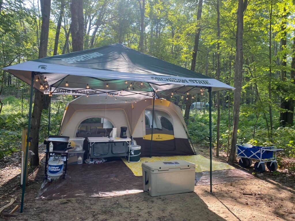 shade tent as mudroom for campsite