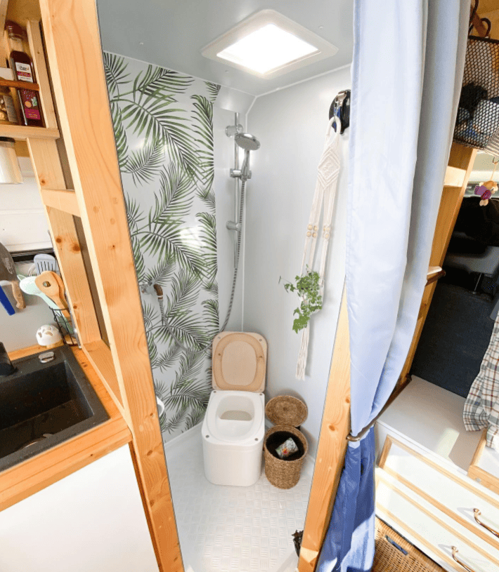 van layout with toilet in shower