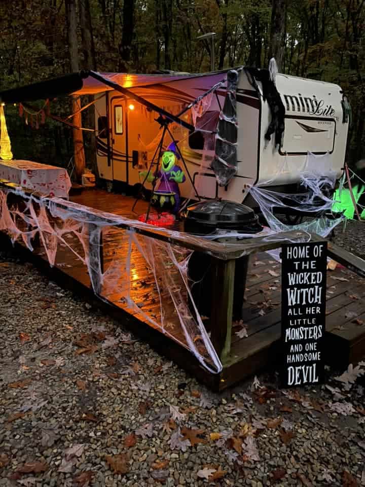 rv camper with spiderwebs for halloween