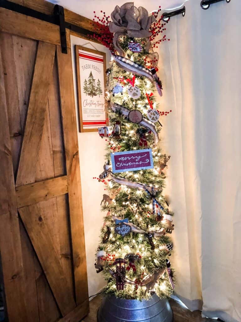 skinny tree with ribbon and white lights farmhouse camp decor