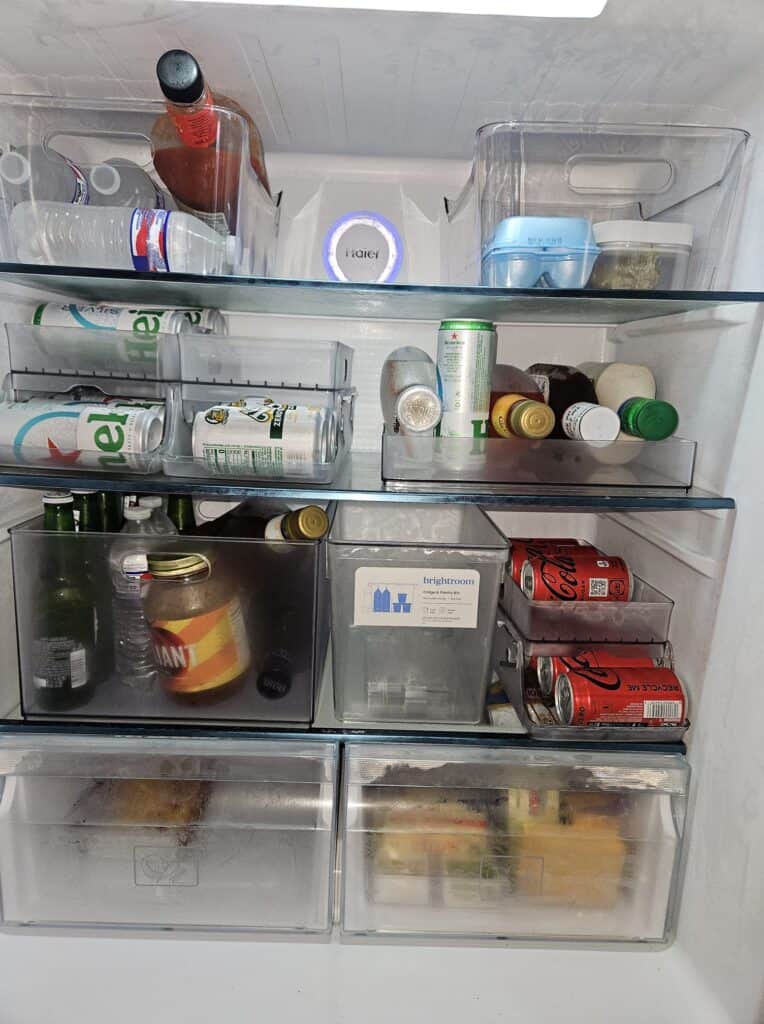 kitchen organization with bins in camper