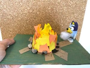 campfire craft idea with ripped paper and light
