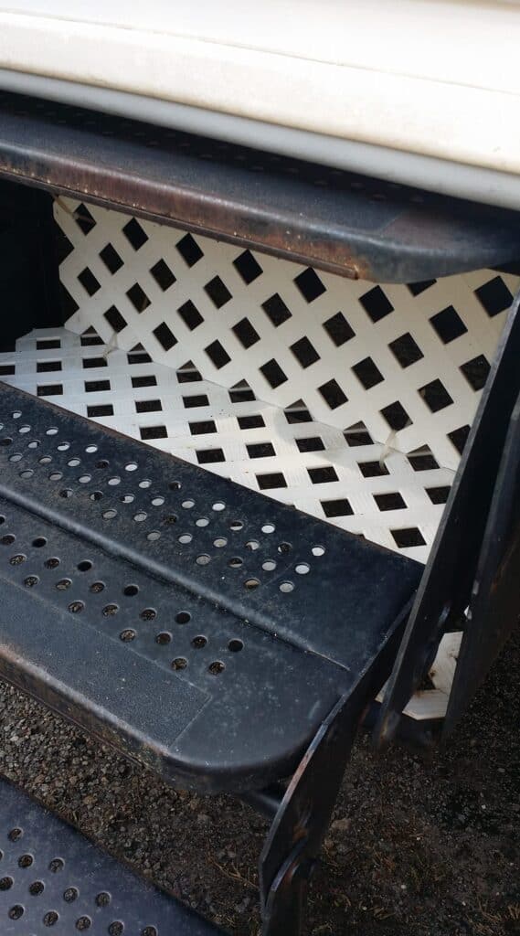 diy shoe storage under camper entry stairs