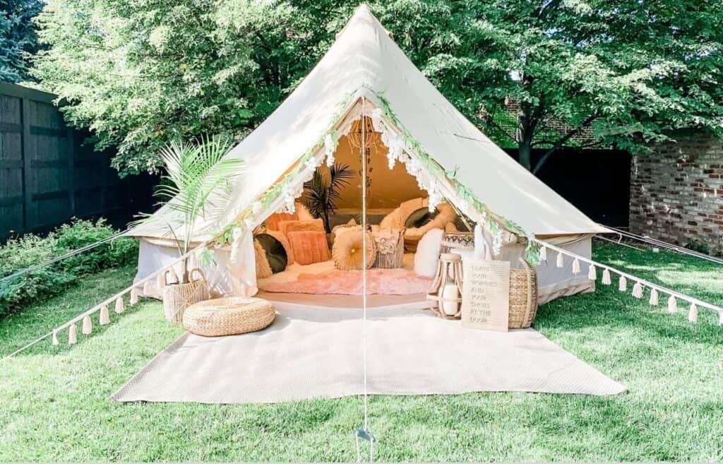 canopy tent with glamping decor