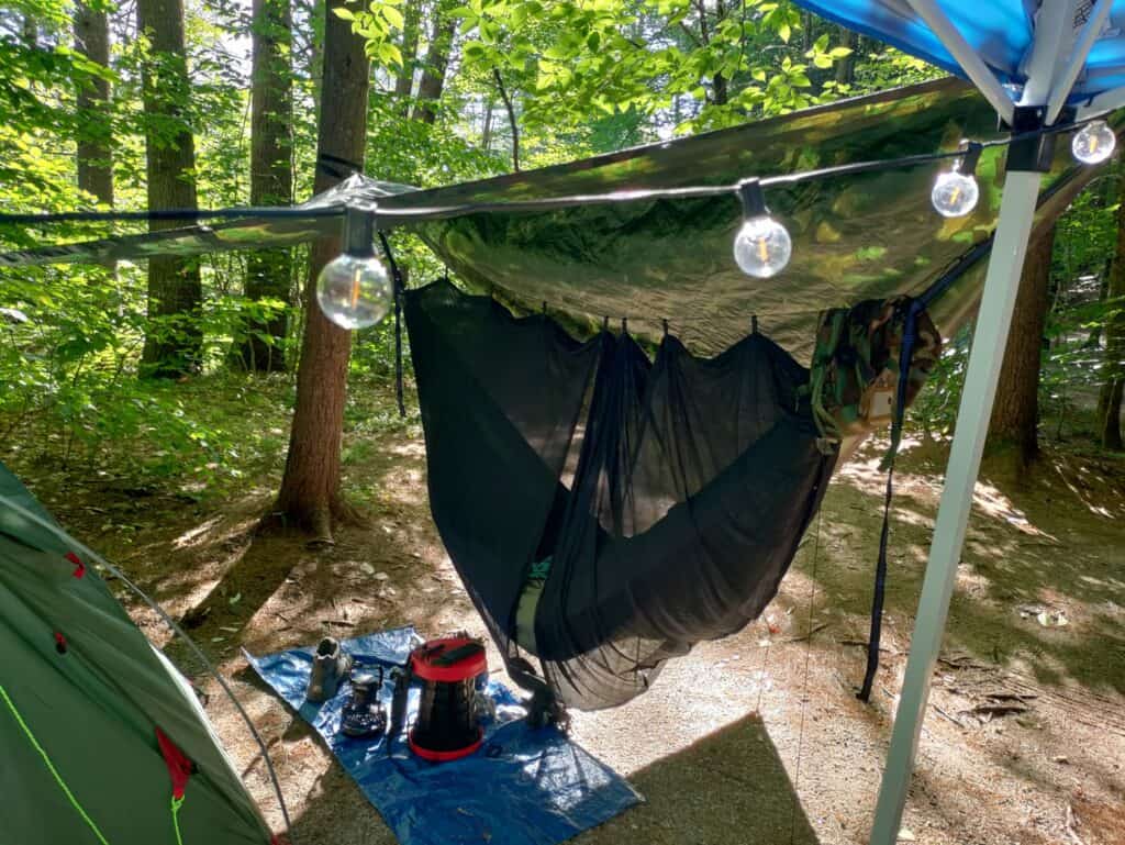 hammock camping tent setup idea with tarp in front of hammock
