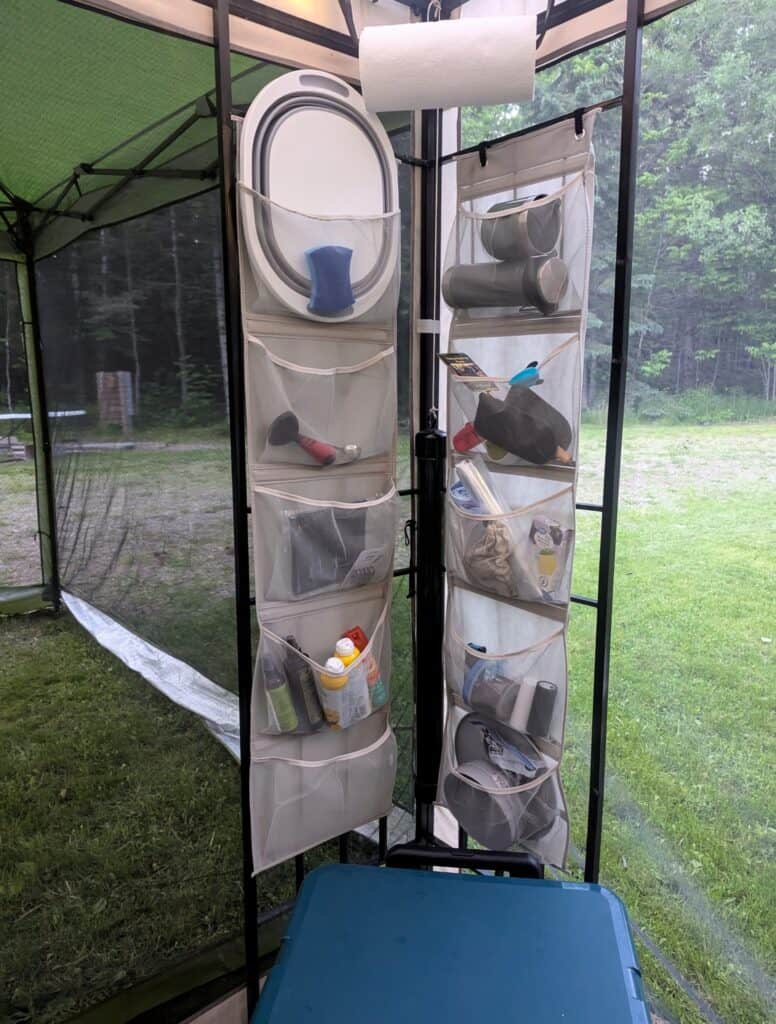 over door organizer from dollar tree uesd to organize tent area