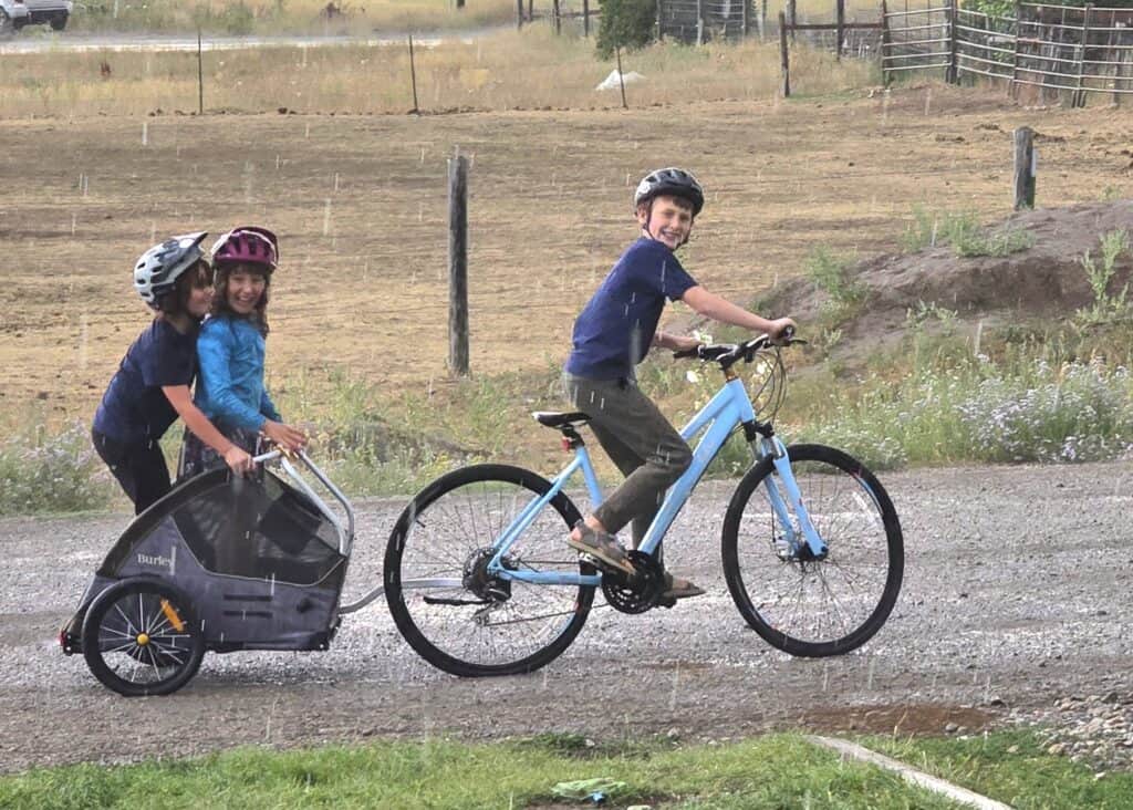 riding through puddles spring kid activity